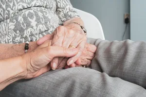 Care Giver Holding Elderly Hand Care Giver Holding Elderly Hand