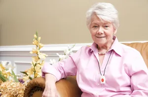 senior grandma wearing help pendant senior grandma wearing help pendant