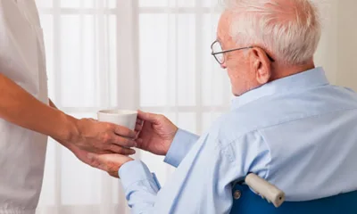 Elderly Man with Care Giver Elderly Man with Care Giver