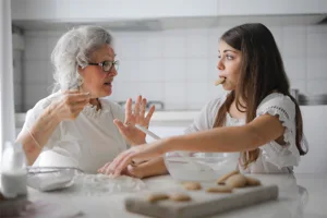 Grandmother and Granddaughter Baking Cookies Grandmother and Granddaughter Baking Cookies