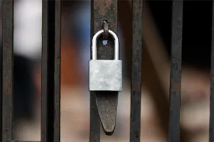 Gray Safety Padlock On Gate Gray Safety Padlock On Gate