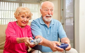 Senior Couple Playing Video Games Senior Couple Playing Video Games
