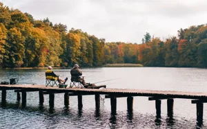 Two Seniors Enjoying The Peace Of Fishing Two Seniors Enjoying The Peace Of Fishing