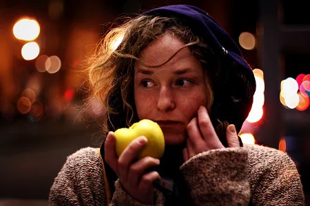 woman eating an apple.alert1