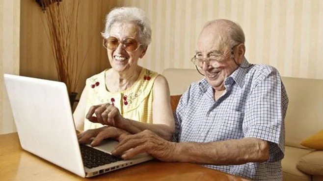 grandparents using laptop grandparents using laptop