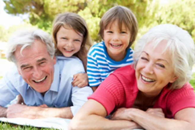 Family On Grass.alert1 medical alert systems Family On Grass.alert1 medical alert systems