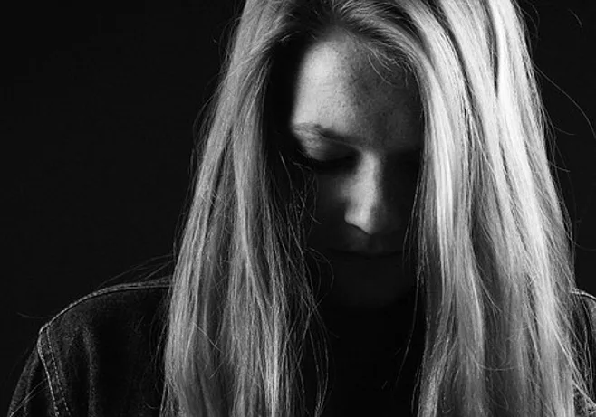 sad young caregiver sad young caregiver