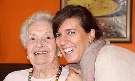 happy mom and daughter laughing happy mom and daughter laughing