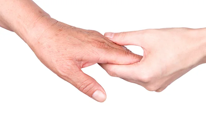senior hand holding senior hand holding