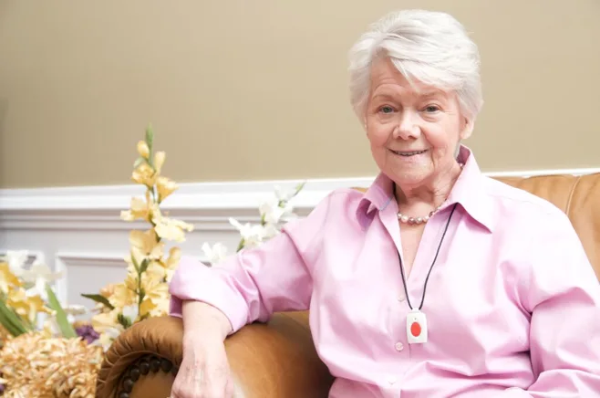 female senior sitting with necklace female senior sitting with necklace