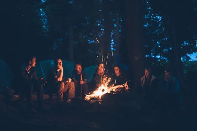 group around campfire. group around campfire.