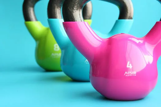 Different colored weights in a row Different colored weights in a row