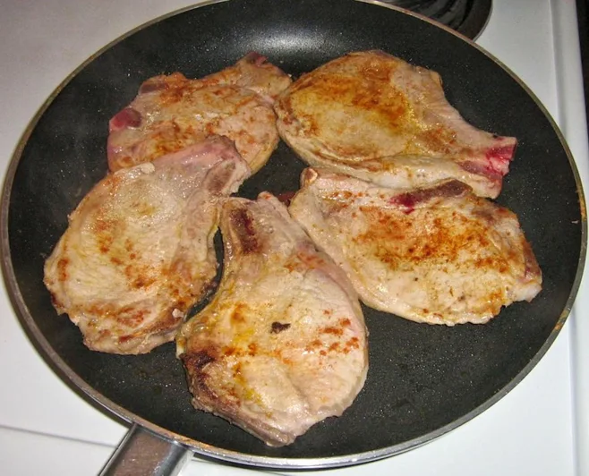 Pork chops in skillet Pork chops in skillet
