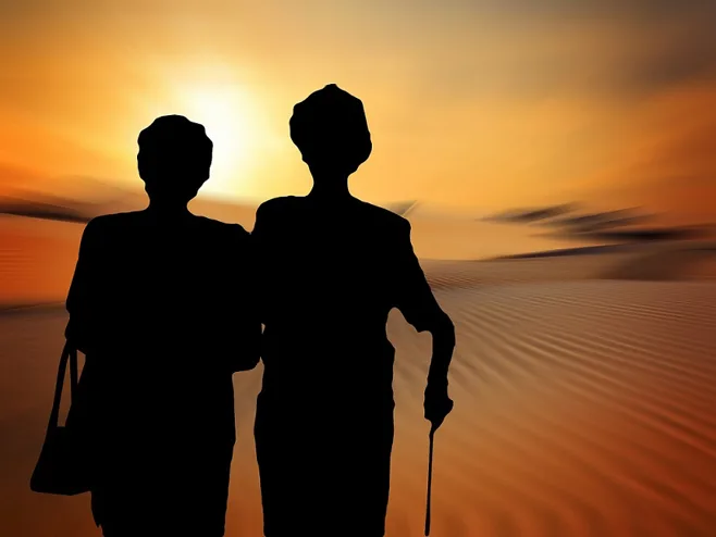 seniors walking sunset.alert1 seniors walking sunset.alert1