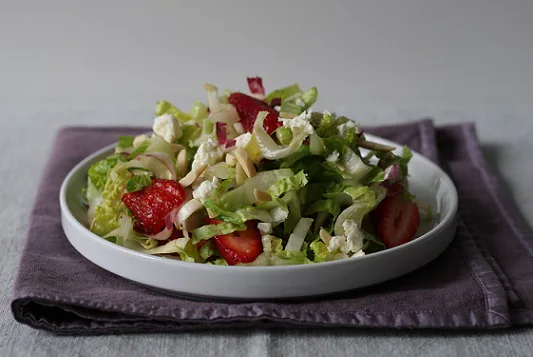 Strawberry and endive salad with feta and almonds