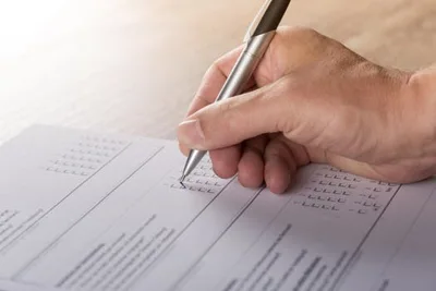 hand filling out paperwork.alert1 medical alert systems hand filling out paperwork.alert1 medical alert systems