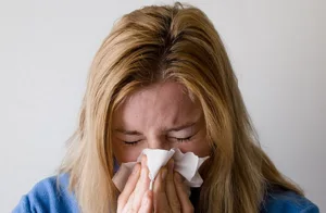 woman sneezing.alert1 medical alert systems woman sneezing.alert1 medical alert systems