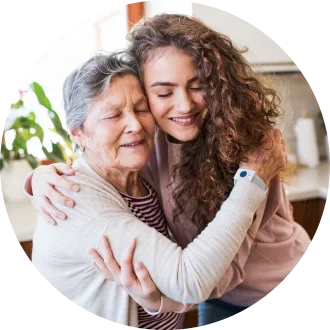 Grandmother and Granddaughter Hugging